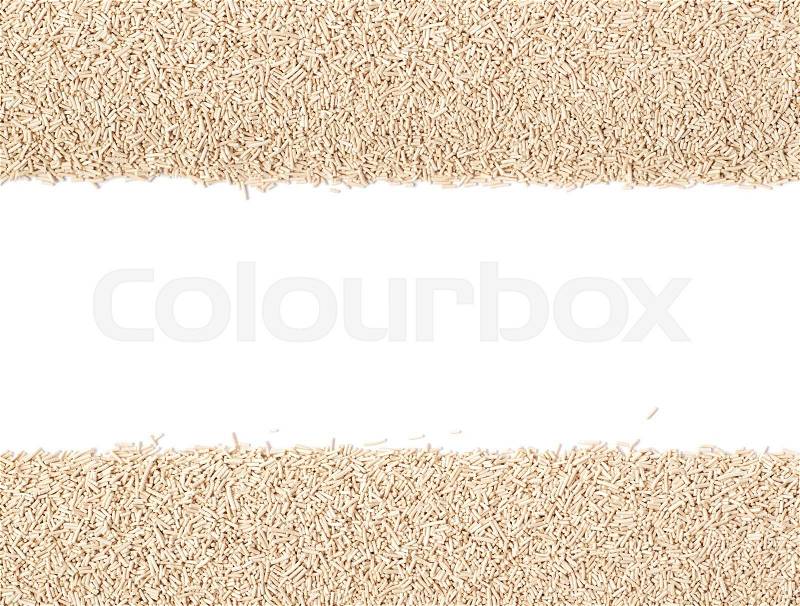 Line of dry yeast isolated over the white background, stock photo
