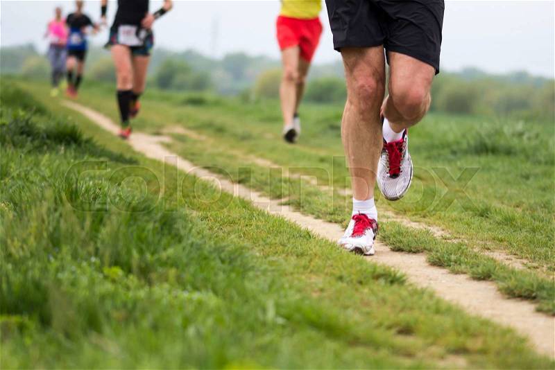 Outdoor marathon cross-country running fitness and healthy lifestyle, stock photo