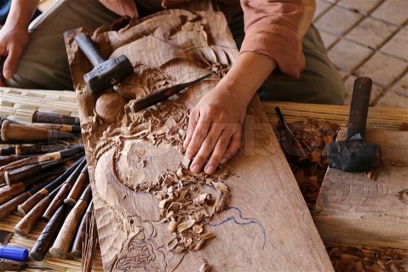 Craftsman carving wood, thai art, stock photo