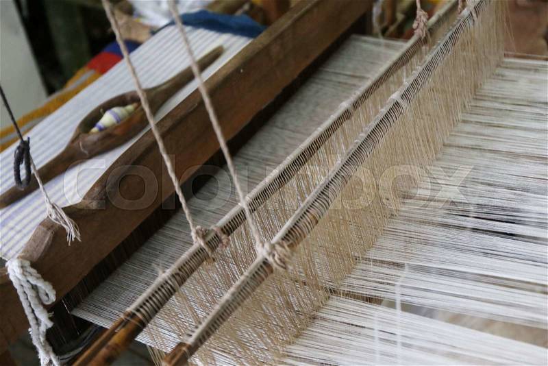 Cotton on the loom background, stock photo