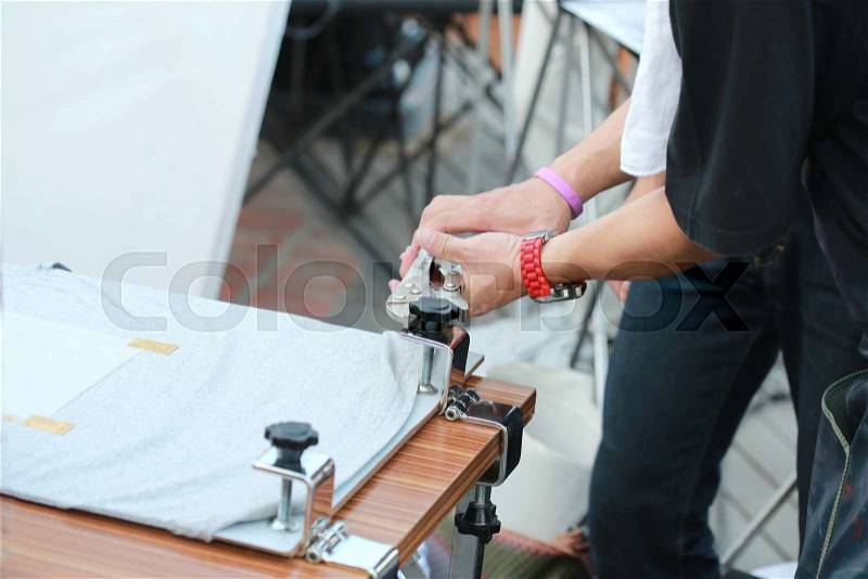 Preparing manual shirt screen print , stock photo