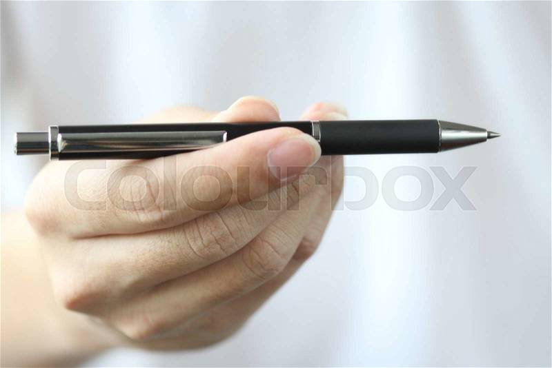 Hand gift pen to you for choose, stock photo