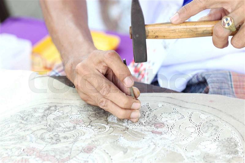 Hand making leather craft, shadow play, Thailand, stock photo