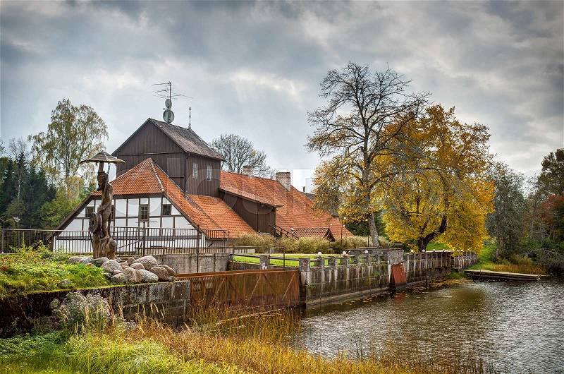 Vellna dzirnavas - old water mill in Latvia, stock photo