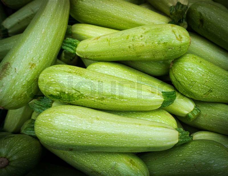 Fresh green zucchini. Zucchini background, stock photo