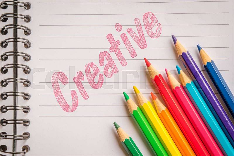Creative colors with pencils on linear paper, stock photo