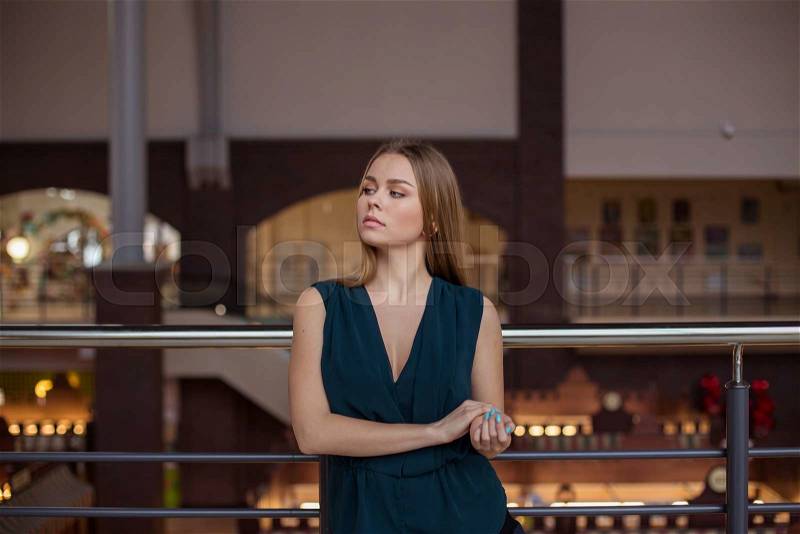 Attractive young woman in the office, stock photo