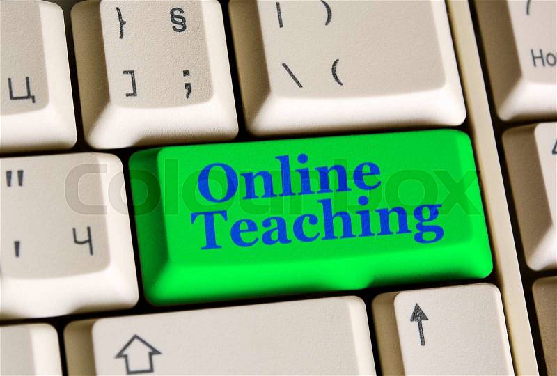 Education concept Online Teaching on green keyboard button, stock photo