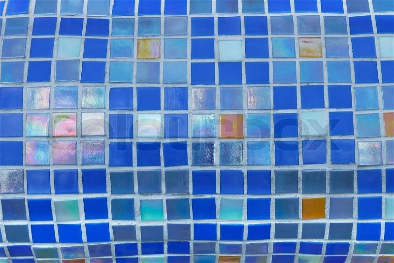 Fragment of colorful mosaics with small square tiles on the toroidal surface. Done mainly in colors of blue, stock photo