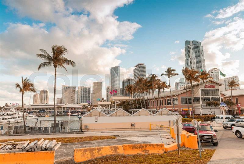 MIAMI - JANUARY 12, 2016: Miami skyline at dusk. The city attracts 10 million tourists annually, stock photo
