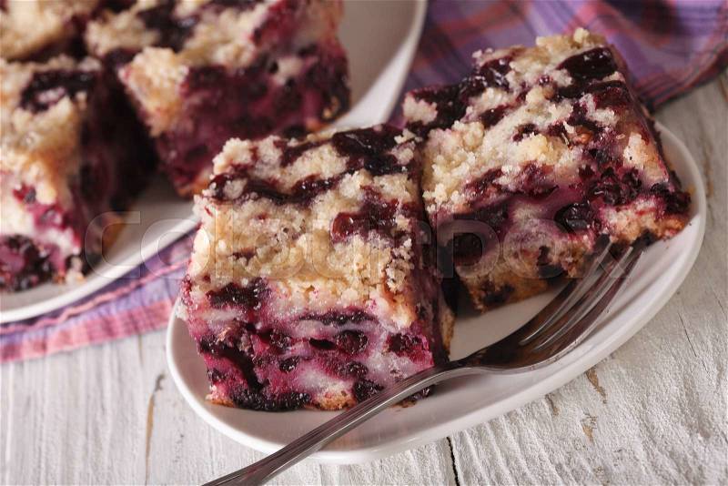 Berry Blueberry Buckle close-up on a plate on the table. horizontal , stock photo