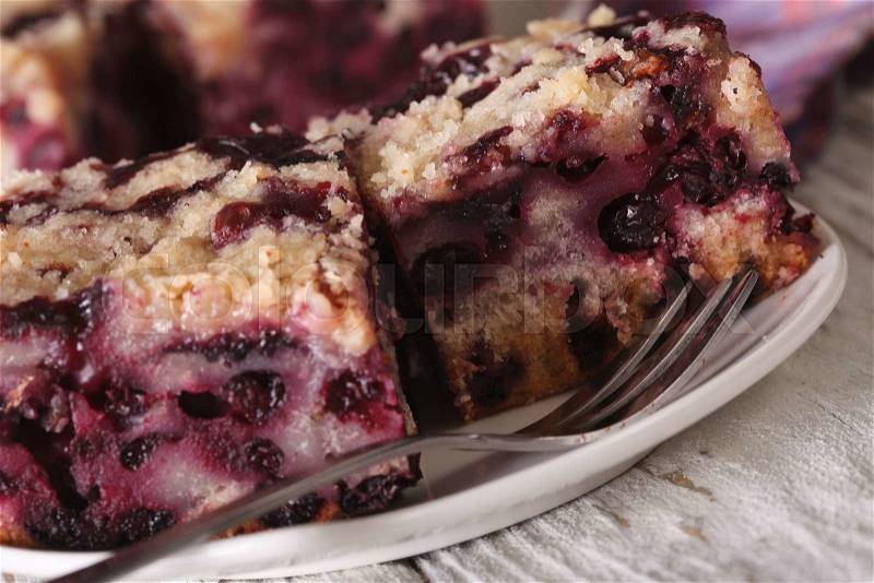 Berry Buckle close up on a plate on the table. horizontal , stock photo