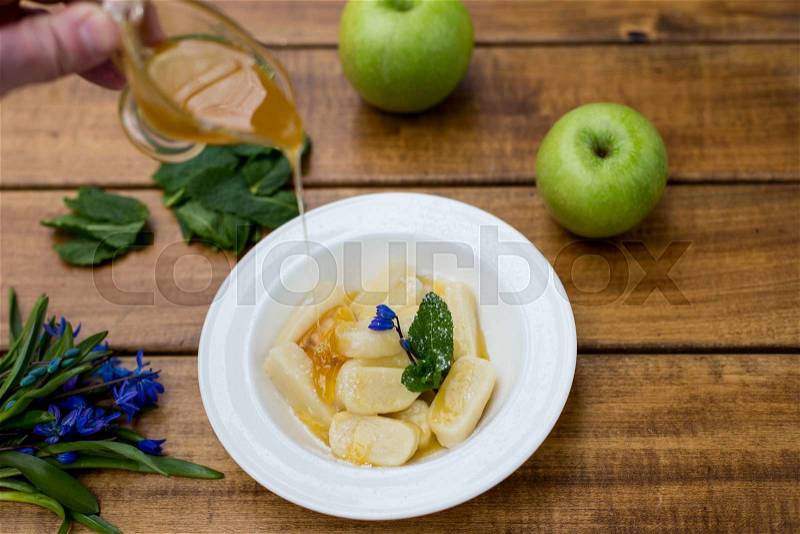 Traditional russian cuisine - vareniki (sweet dessert from cottage cheese), stock photo