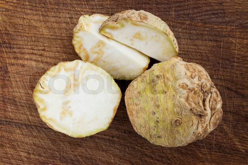The celery root on a wooden background, stock photo
