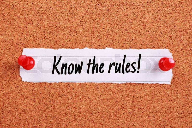 Text Know The Rules written on note paper pinned on the corkboard, stock photo