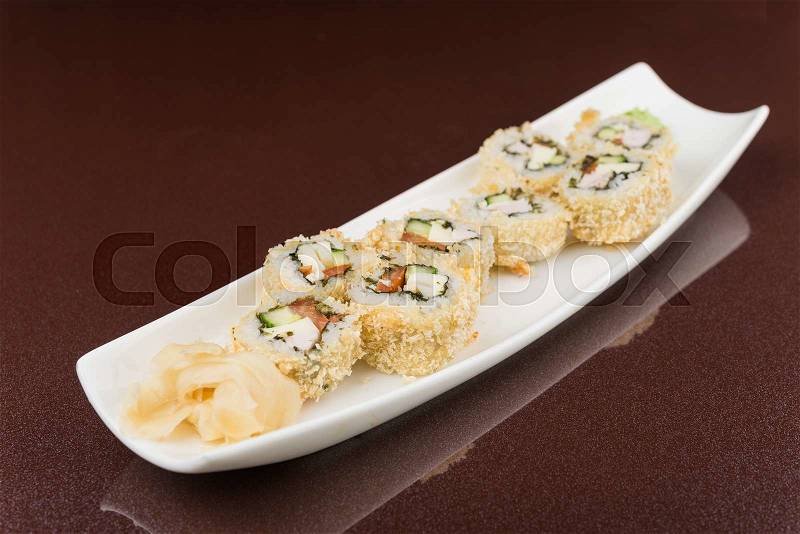 Traditional asia food. sushi rolls on white plate, stock photo