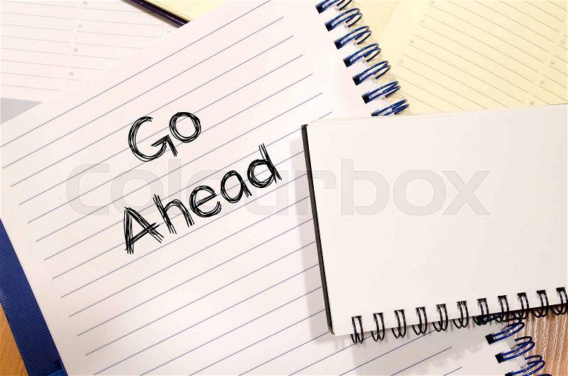 Go ahead text concept write on notebook, stock photo