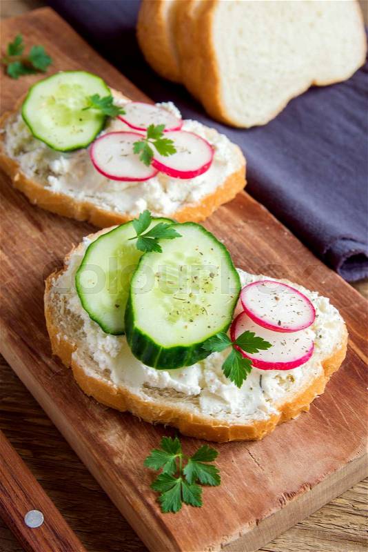 Vegetarian sandwiches with ricotta cheese and fresh vegetables , stock photo
