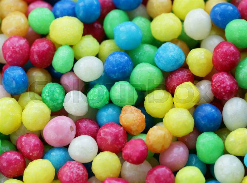 Multi-colored fruit jelly beans sweet candy topping, stock photo