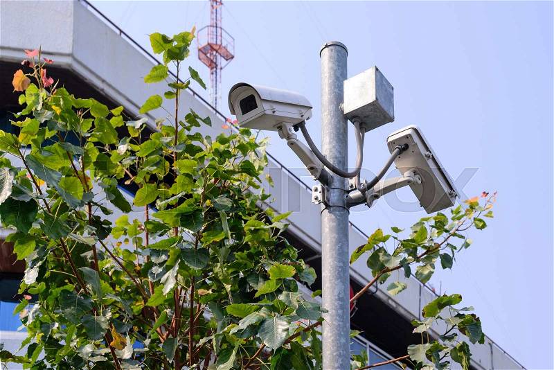 Security camera for monitor events in city, stock photo