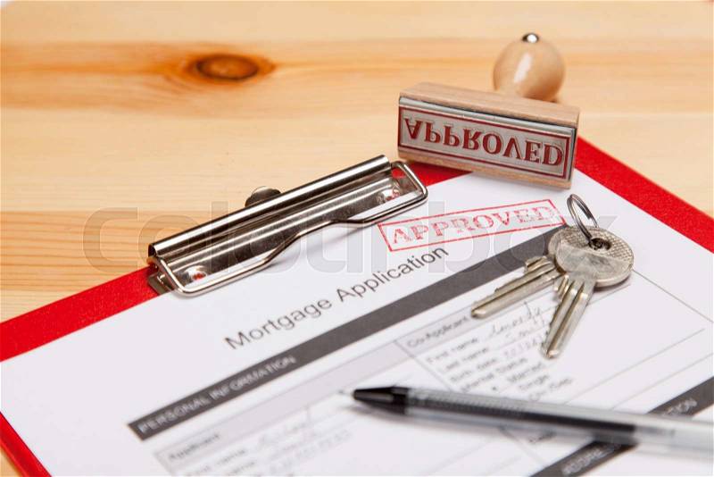 Mortgage application form and keys, stock photo