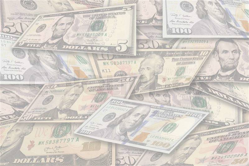 Backdrop tempolate image with pile of dollar banknotes in different currency 5, 10, 50, 100 dollar currency of the United States useful as a background with copyspace, stock photo