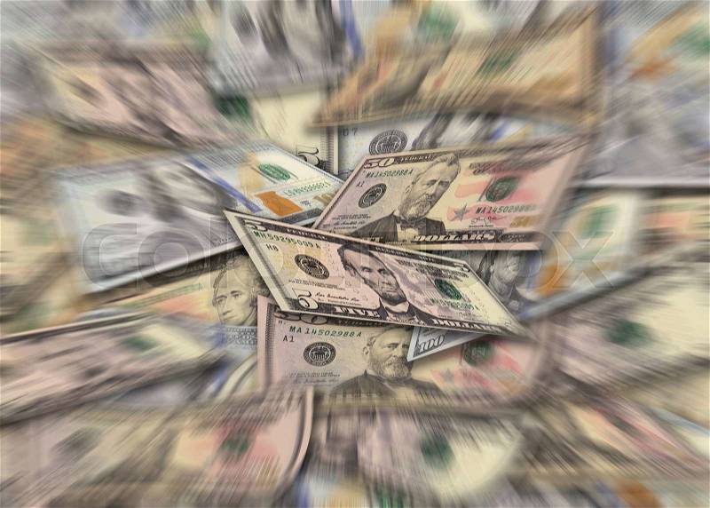 Pile of dollar banknotes in different currency 5, 10, 50, 100 dollar currency of the United States useful as a background with zoom effect, stock photo