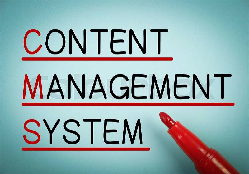 Content Management System CMS text with red underline is written on blue paper, stock photo