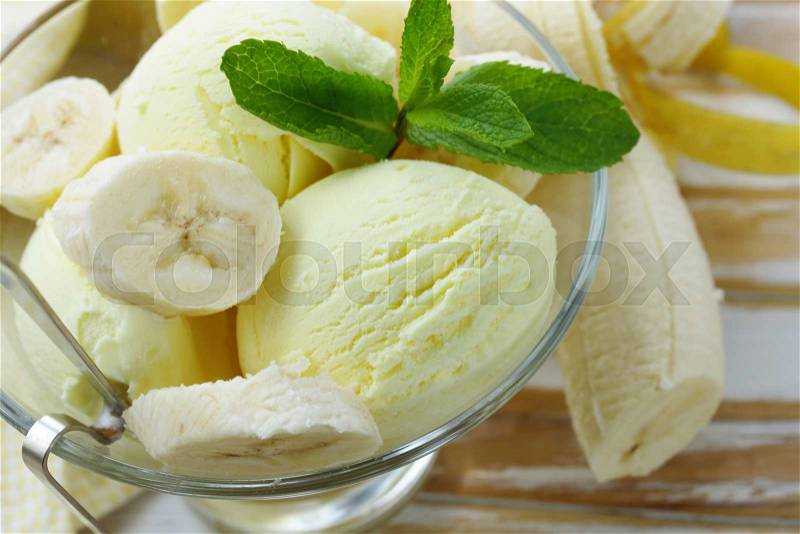 Fruit ice cream with fresh banana and mint, stock photo