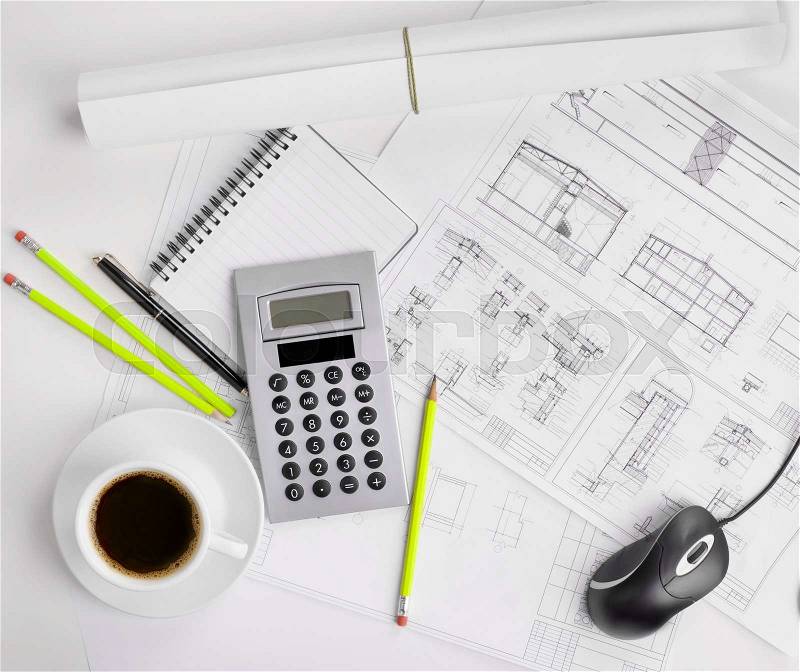 Construction plans and coffee, stock photo