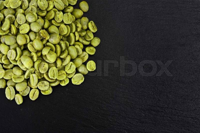 Health Care: Grains of green coffee. Studio Photo, stock photo