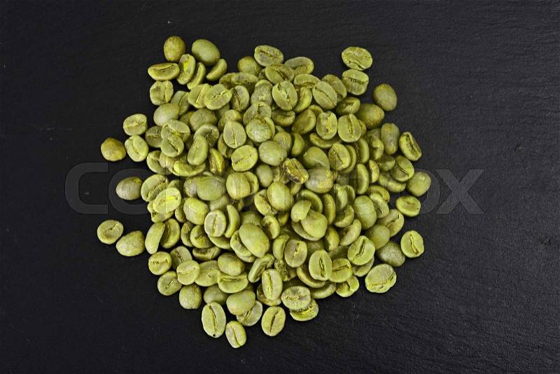 Health Care: Grains of green coffee. Studio Photo, stock photo