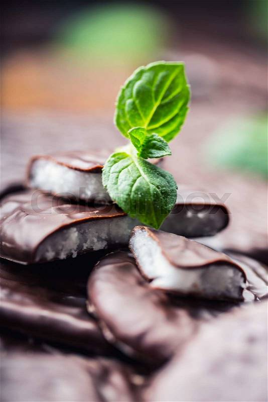Chocolate peppermint cookies.Mint. Peppermint. Menthol. Black chocolate with peppermint cream. Black chocolate with mint stuffing. Menthol chocolate with mint leaves. Toned images, stock photo