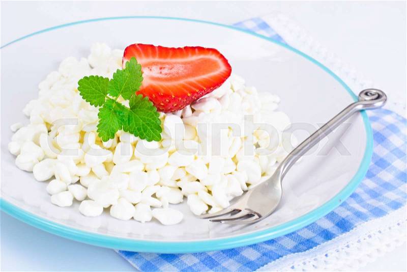 Home Dietary Fat Cottage Cheese Beaded Curd with Strawberry Studio Photo, stock photo