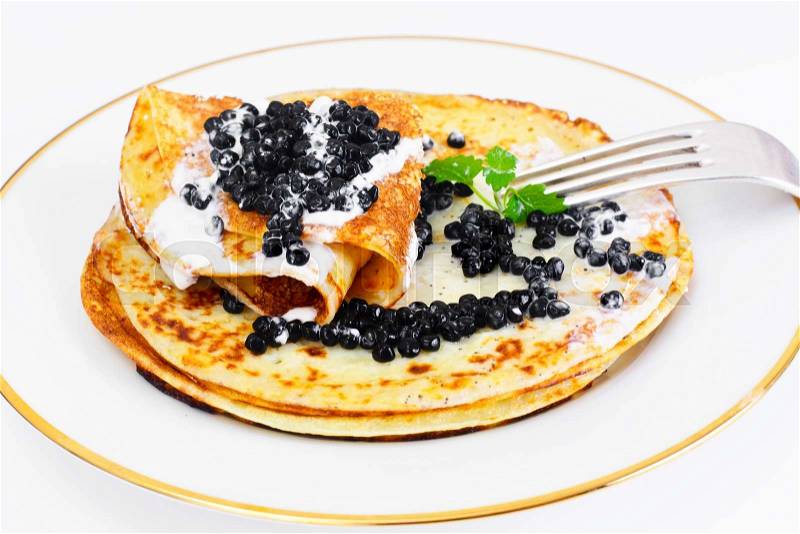Pancakes with Black Caviar Studio Photo, stock photo