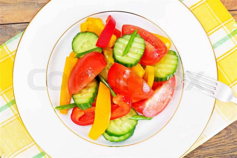 Healthy and diet food: Lettuce, tomato, pepper, seeds, oil, salt. Studio Photo, stock photo