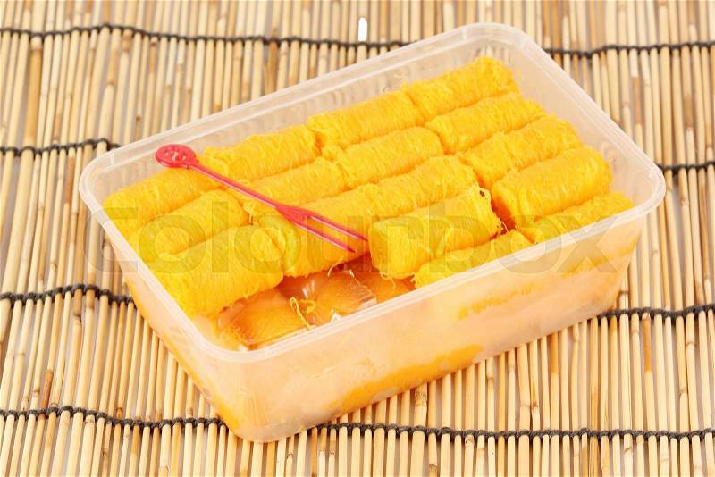 Delicious thai dessert in Plastic box call it \