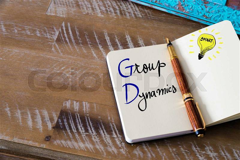 Conceptual Business Acronym GD Group Dynamics. Retro effect and toned image of a fountain pen on a notebook, stock photo