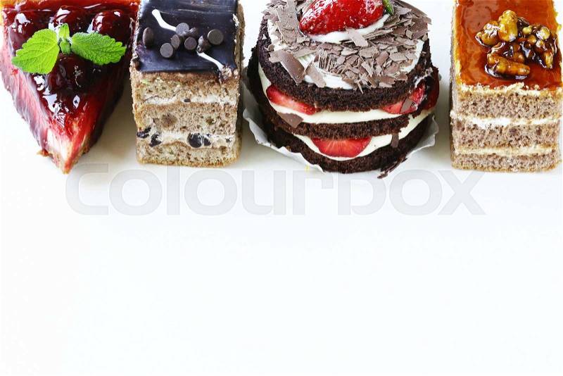 Assorted desserts, cakes and pastries on a white background, stock photo