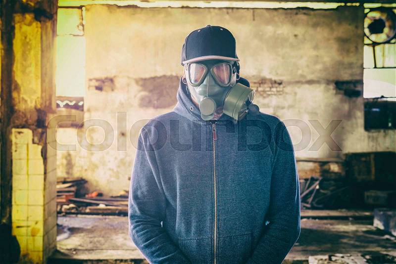 Portrait of man with gas mask on his face,selective focus , stock photo