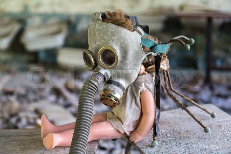 Creepy doll in middle school in Pripyat, Chernobyl region, Ukraine in a summer day, stock photo