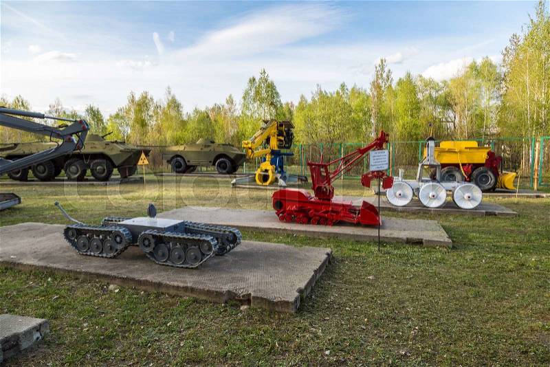 Cemetery of robots worked in the reactor in Chernobyl nuclear station, Ukraine in a summer day, stock photo