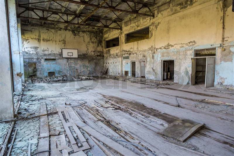 Abandoned sport court in Pripyat, Chernobyl region, Ukraine in a summer day, stock photo