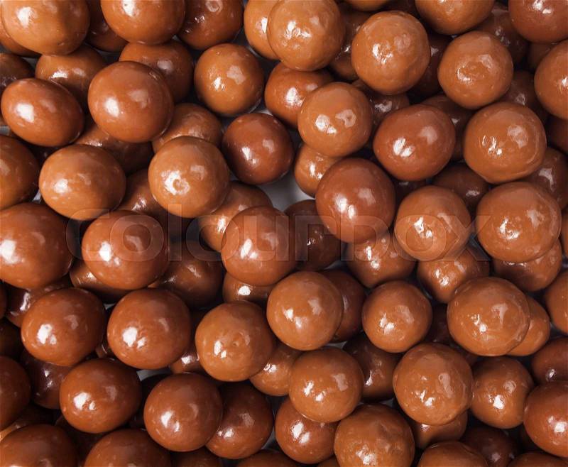 Chocolate candies background. Closeup brown chocolate candy background, stock photo