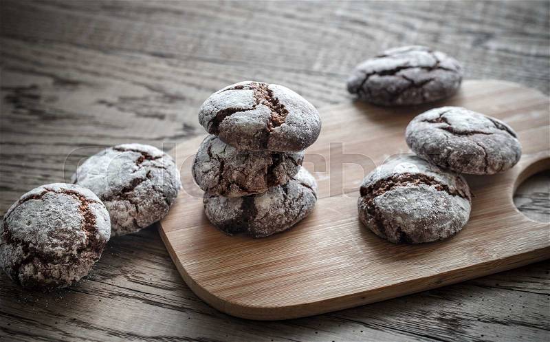 Chocolate cookies on the wooden board, stock photo