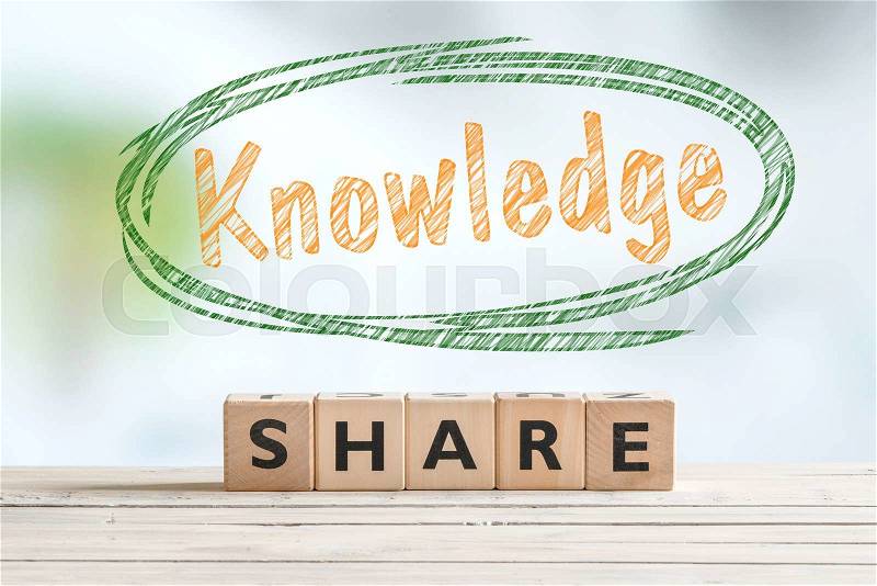 Share knowledge sign on a table with a sketch, stock photo
