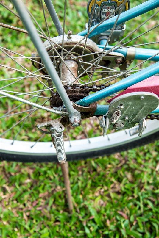 Close up of Old bicycle part in the garden, stock photo