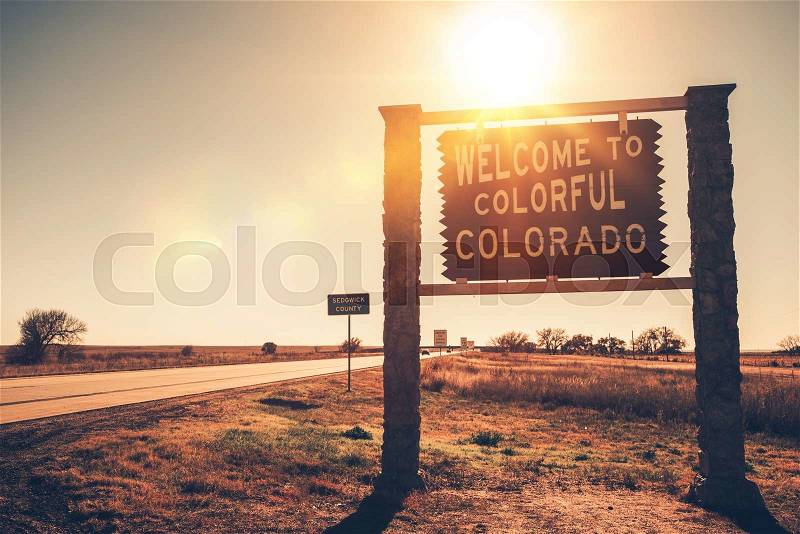 Colorado State Welcome Wooden Sign on a Side of the Highway. Colorado, USA, stock photo