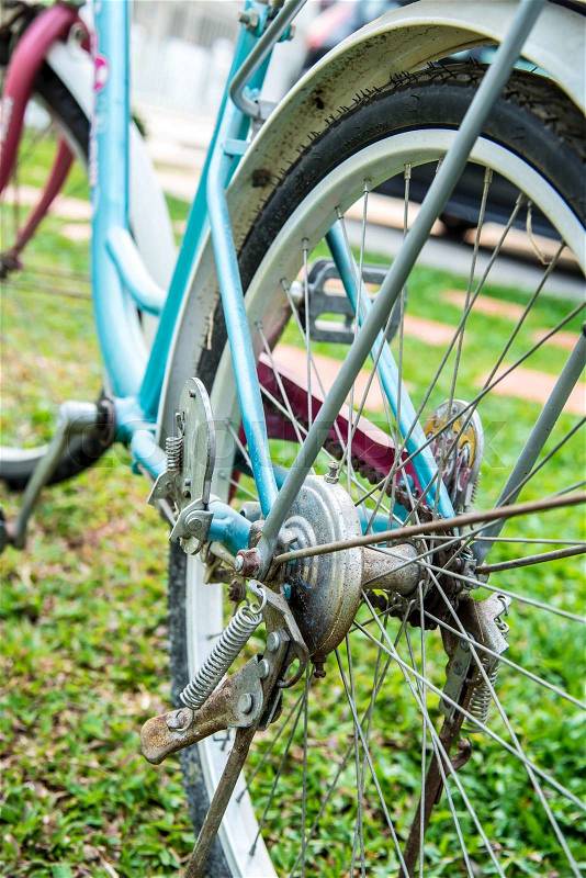 Close up of Old bicycle part in the garden, stock photo