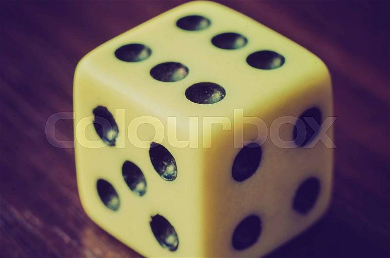 Old dice on the table macro, stock photo